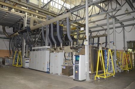 Automatic single-row line for galvanic copper plating on steel hinges.